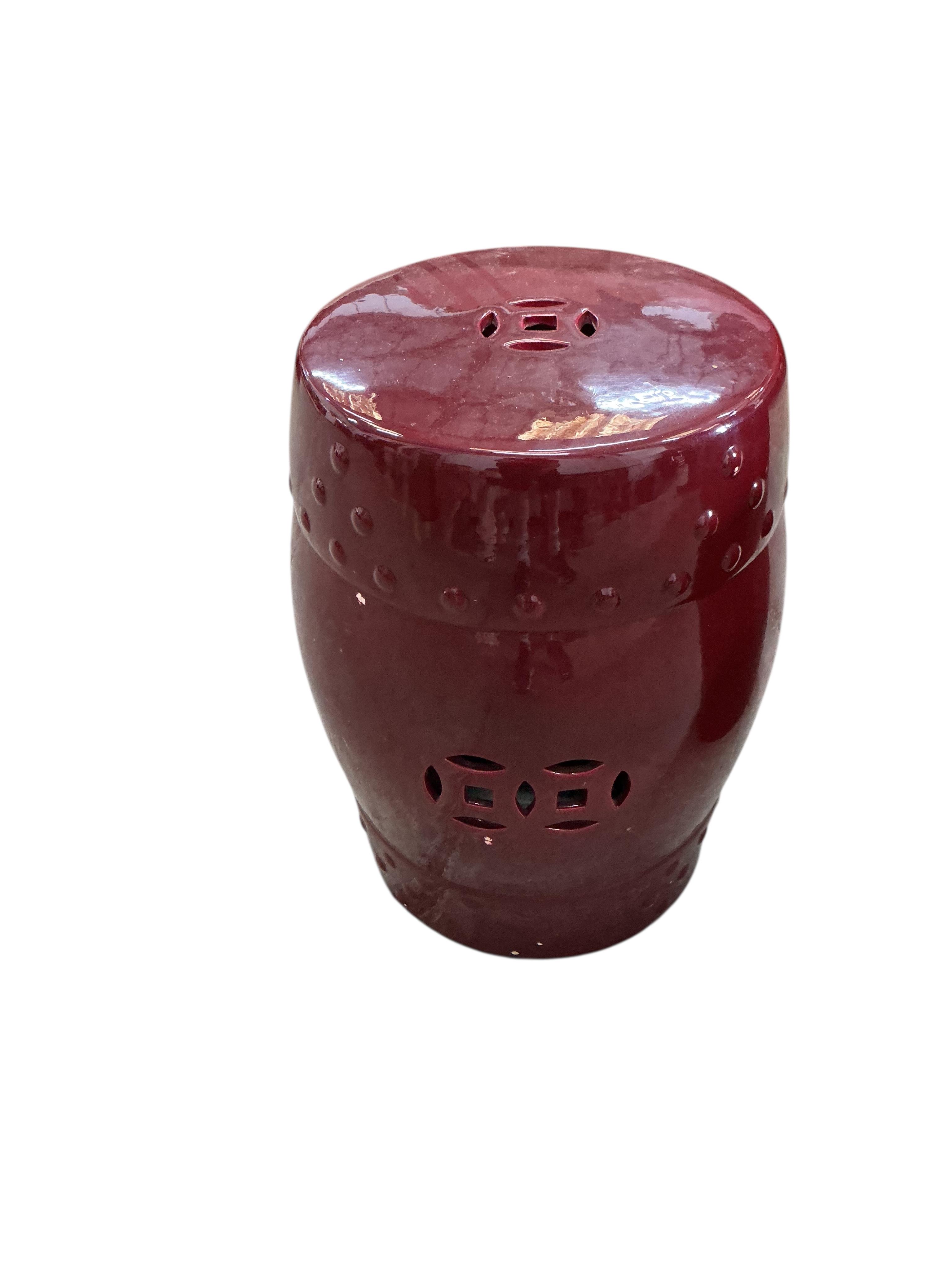 A pair of Chinese flambé glazed earthenware garden seats, diameter 32cm, height 47cm, Provenance: The late Kenneth Turner (1936-2025), celebrity florist, designer and perfume retailer, he received the Royal Warrant from